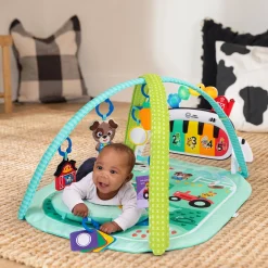 Baby Einstein                    Tapis d'éveil 4-en-1 Kickin’ Tunes Musical Meadow    Vert