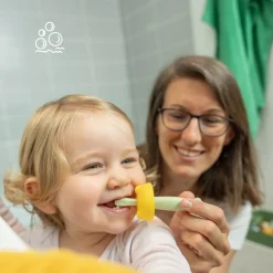 Badabulle Brosse à dents évolutive en silicone Vert/Jaune