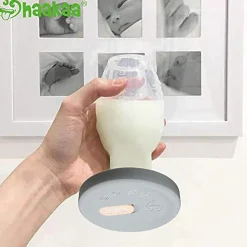 Haakaa                    Couvercle en silicone pour recueil-lait    Gris