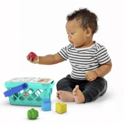 Hape Panier trieur de formes Magic Touch Turquoise