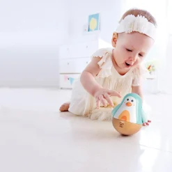 Hape                    Pingouin culbuto    Blanc Et Turquoise