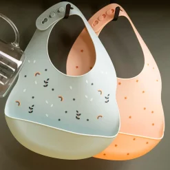 Nattou                    Bavoir silicone imprimé étoiles    Pêche